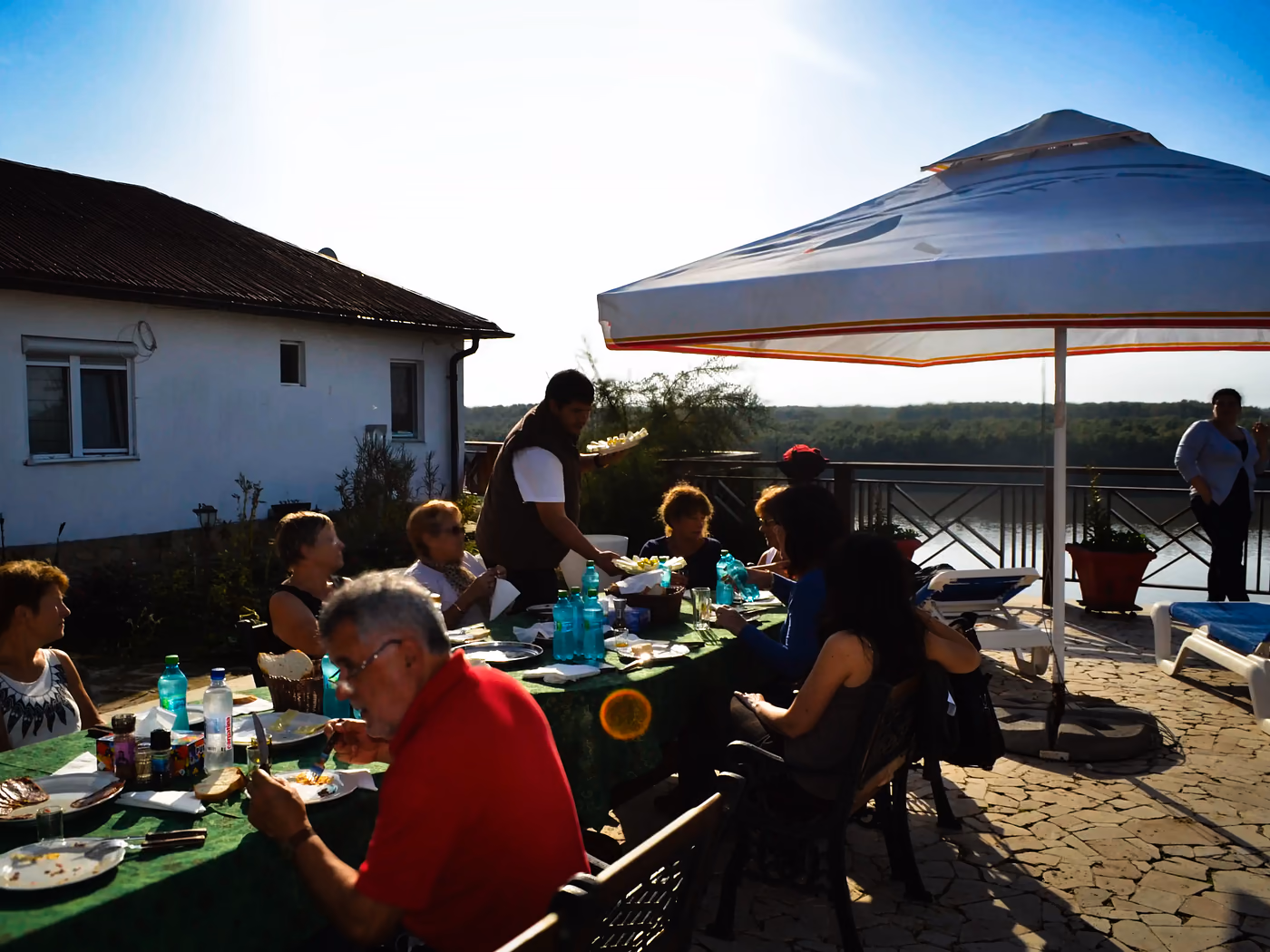 Outdoor lunch at the winery with a view toward the Dobrogean landscape